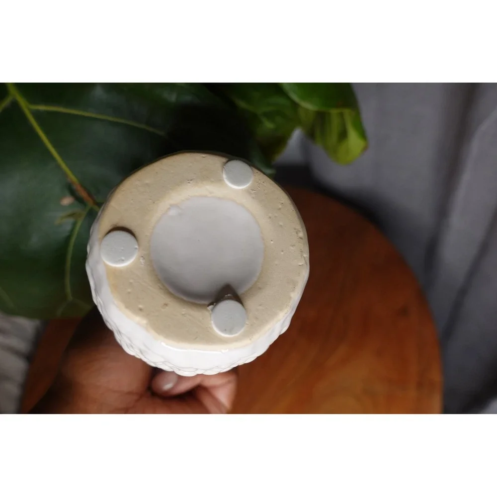 White vase with long neck and‎ gourd like ribbed textured